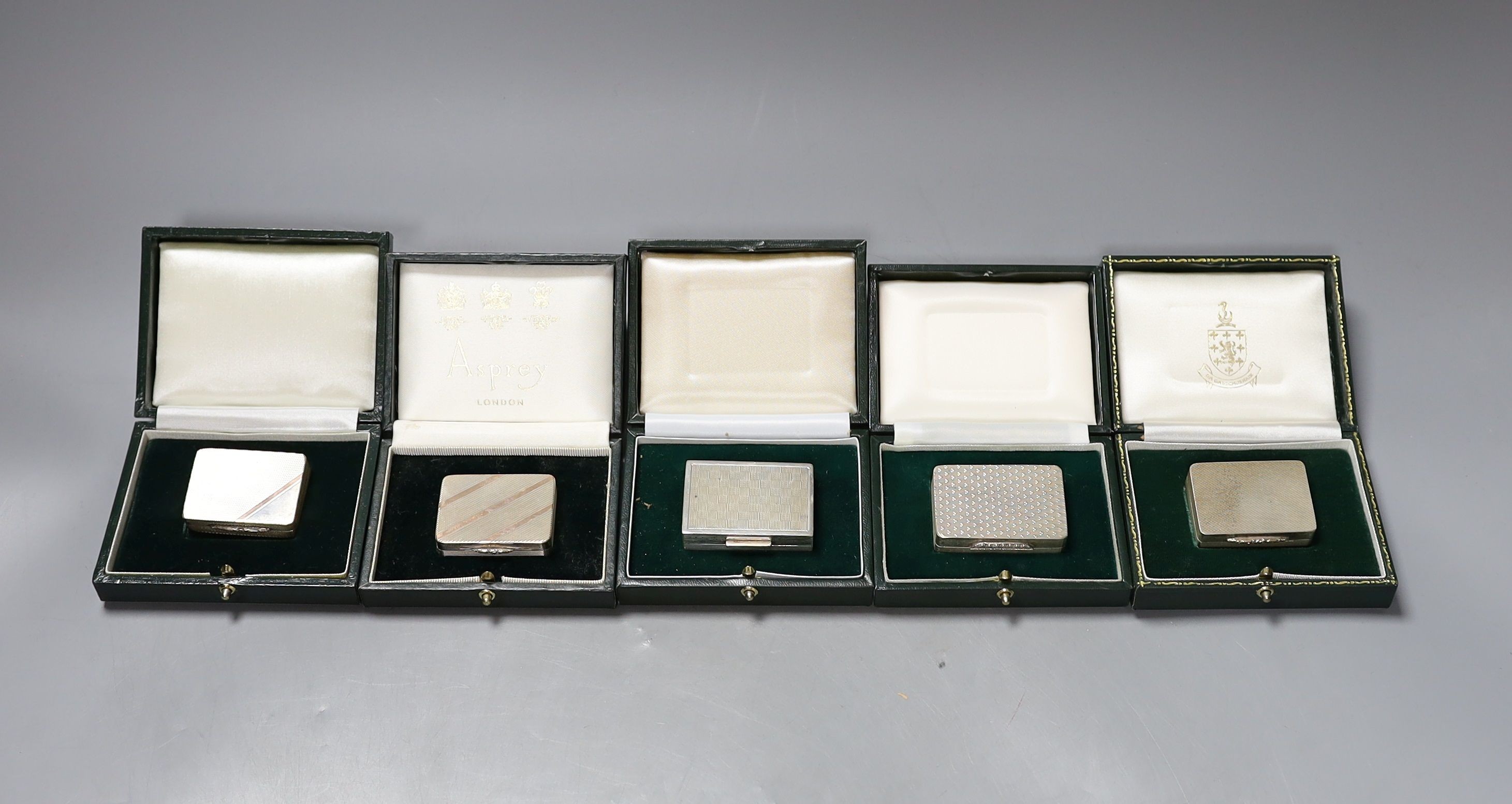 Six assorted modern silver or parcel gilt silver pill boxes by Peter John Doherty, Birmingham, 1965-2000 largest 52mm, all in fitted Gallagher boxes, one by Asprey.